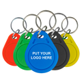 MARCA BLANCA RFID-TAG-C300 - Llavero TAG de proximidad personalizable - EM 125 kHz pasivo | 300 unidades - Número ID y logo personalizado impresos - Logo personalizado de hasta 2 colores - Color del TAG elegible entre 5 diferentes - Enviar al comercial lo